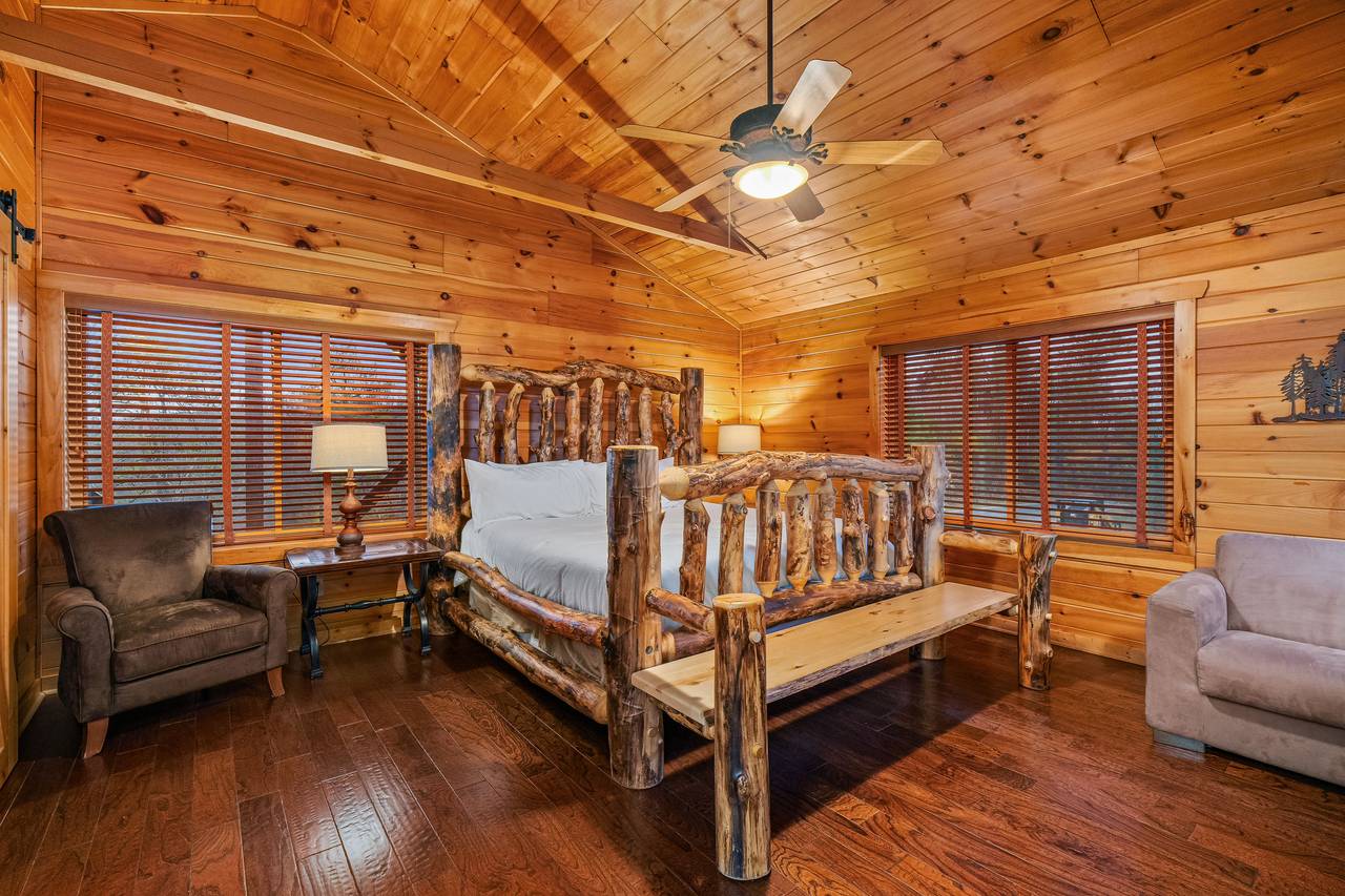 Upper level king with TV and comfy seating. Upper level king with TV and comfy seating.