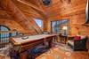 Upper level loft with pool table, comfy seating, and TV Upper level loft with pool table, comfy seating, and TV