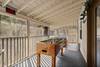 Foosball table covered on screened porch Foosball table covered on screened porch