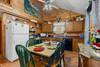 Dining area and kitchen Dining area and kitchen