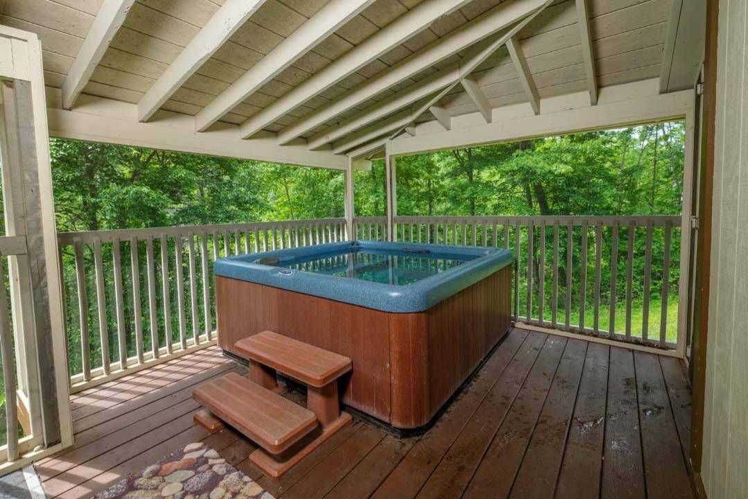 Relax in your private hot tub, covered on the screened porch!
