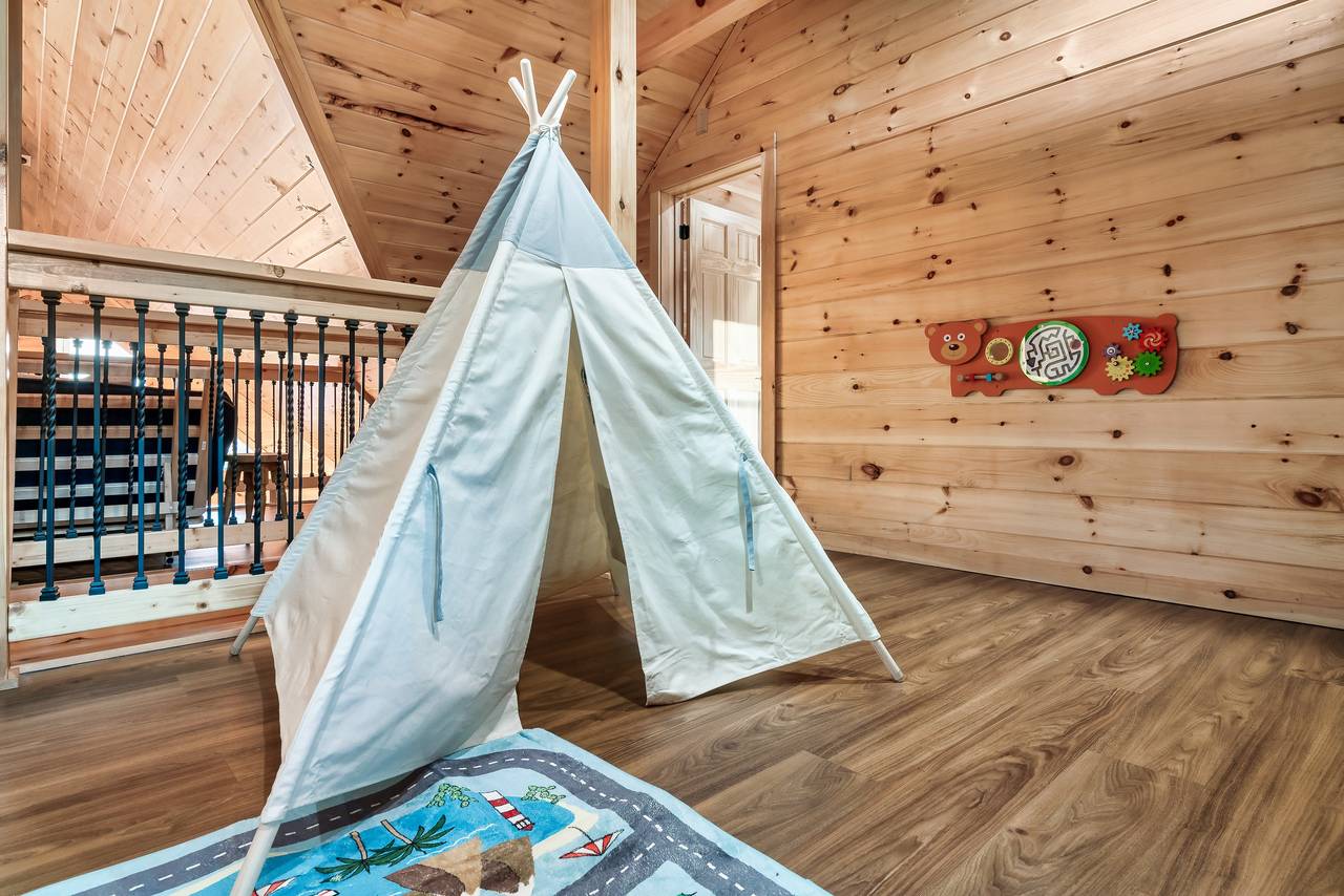 Upper level loft with 2 twin bunks and kids table Upper level loft with 2 twin bunks and kids table