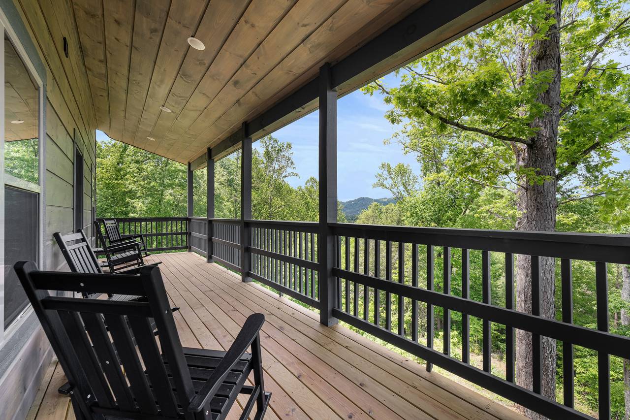 Covered Deck With Seating and Scenic Views Covered Deck With Seating and Scenic Views