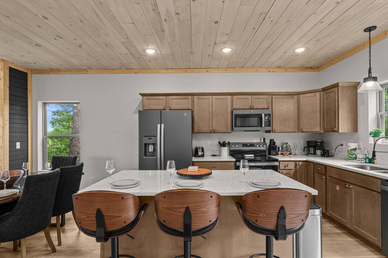 Additional seating at the kitchen island. Additional seating at the kitchen island.