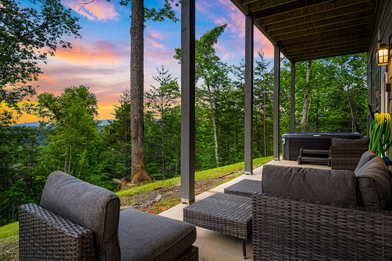 Covered Deck With Seating and Scenic Views Covered Deck With Seating and Scenic Views