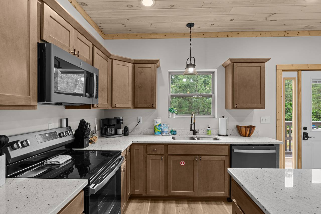 Fully Equipped Kitchen With Stainless Appliances Fully Equipped Kitchen With Stainless Appliances
