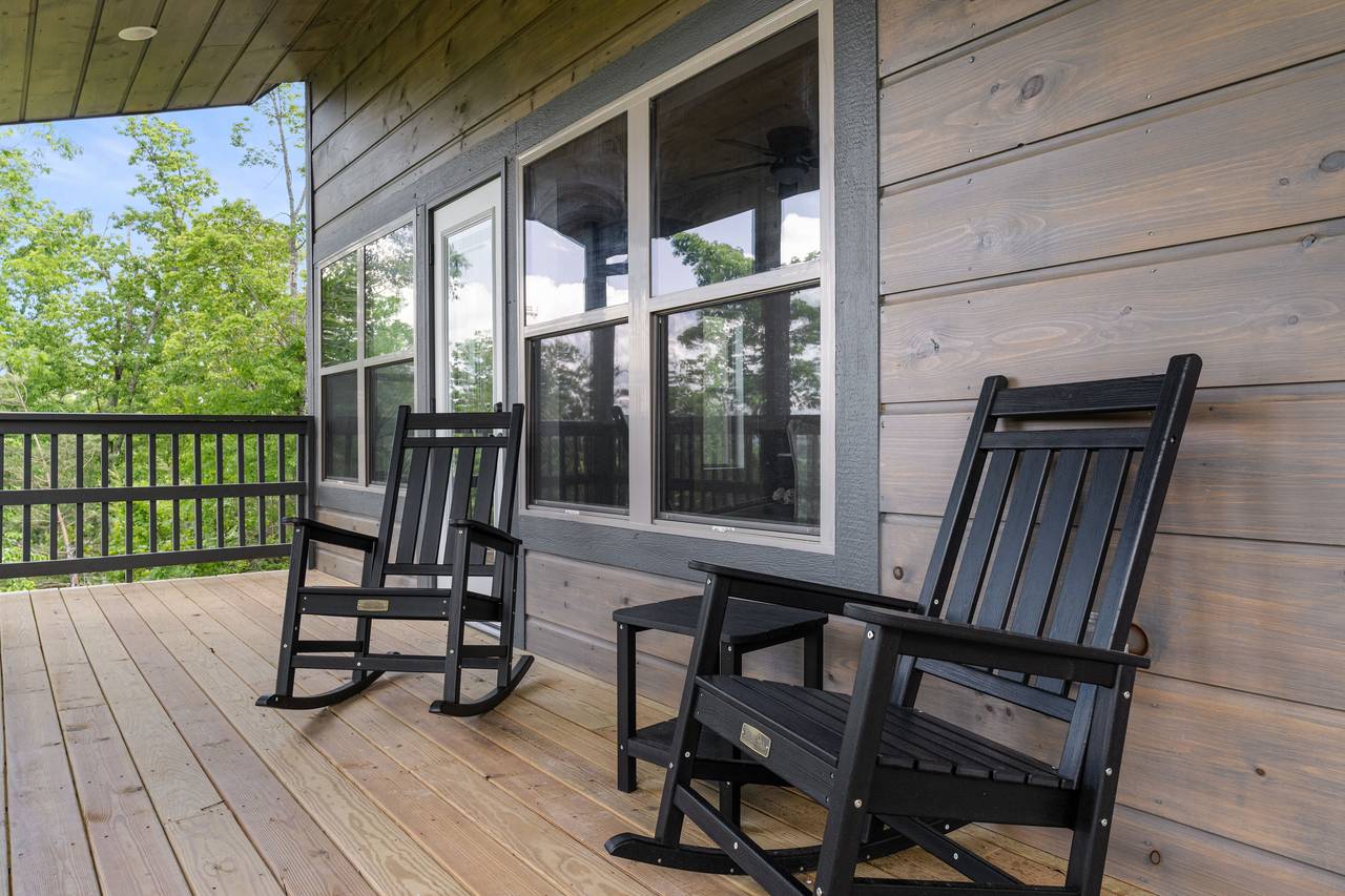 Covered Deck With Seating and Scenic Views Covered Deck With Seating and Scenic Views