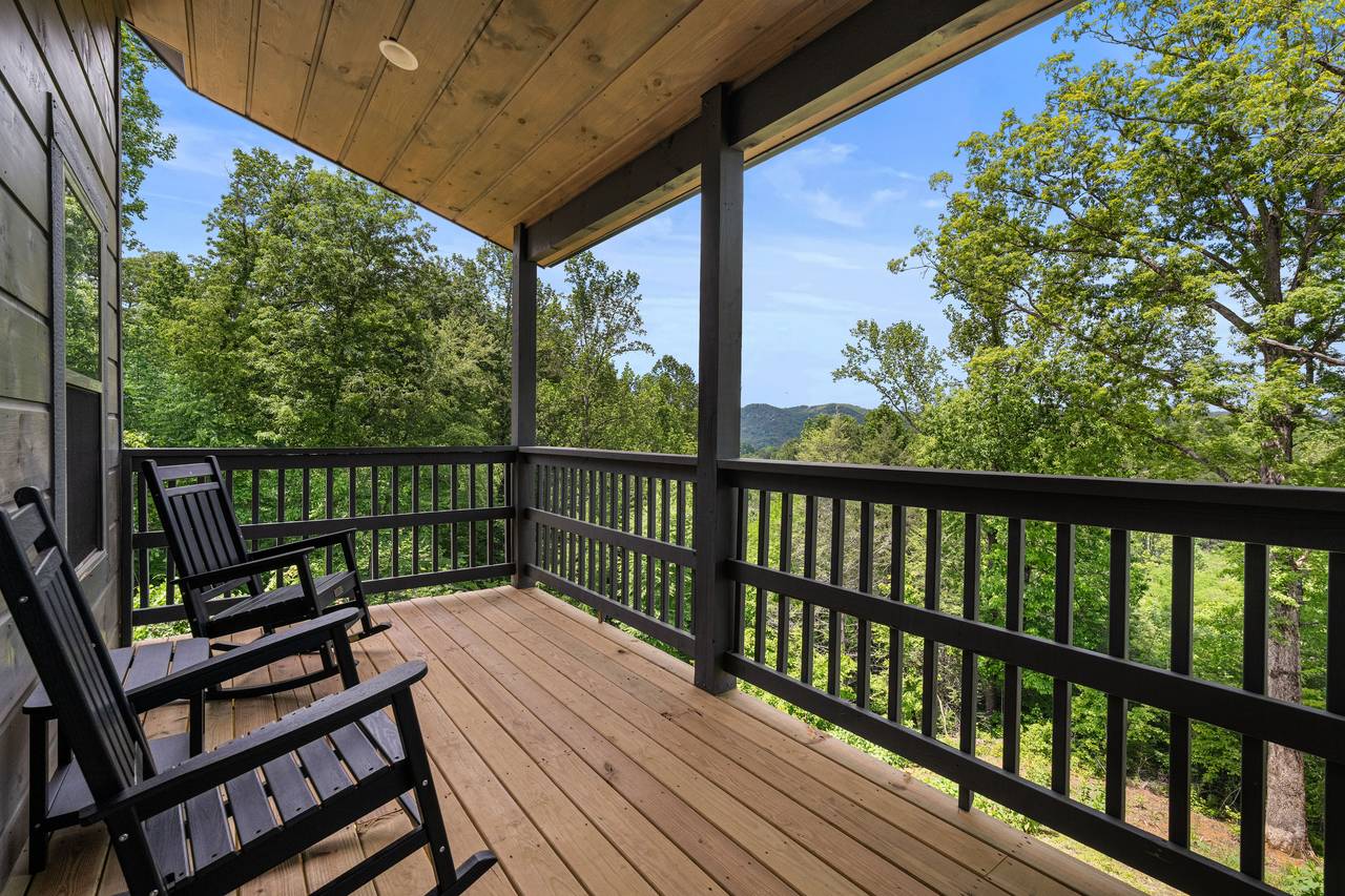 Covered Deck With Seating and Scenic Views Covered Deck With Seating and Scenic Views