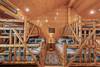 Upper level bunk room with 2 queen-over-twin bunks Upper level bunk room with 2 queen-over-twin bunks