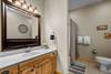 Lower level ensuite with tub/shower combo & vanity Lower level ensuite with tub/shower combo & vanity