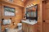 Upper level ensuite with tub/shower & mountain decor Upper level ensuite with tub/shower & mountain decor