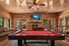 Game room with pool table, arcade games & foosball Game room with pool table, arcade games & foosball