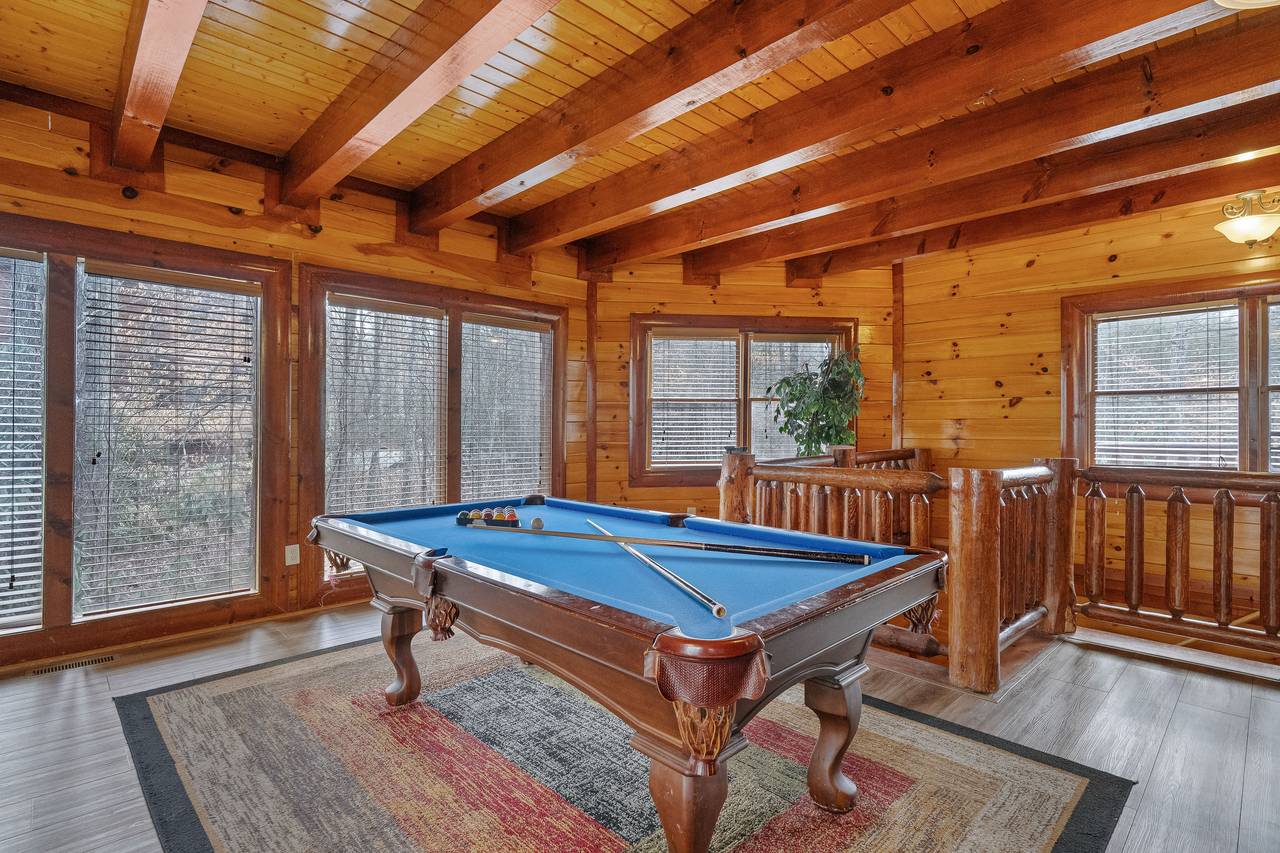 Pool table - Fun-filled game room entertainment. Pool table - Fun-filled game room entertainment.