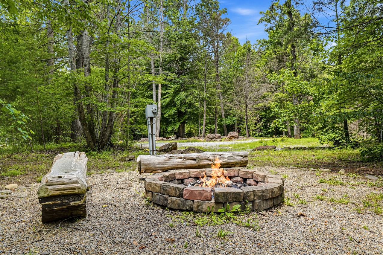 Gather around the fire pit for stories, laughter, and s'mores. Gather around the fire pit for stories, laughter, and s'mores.