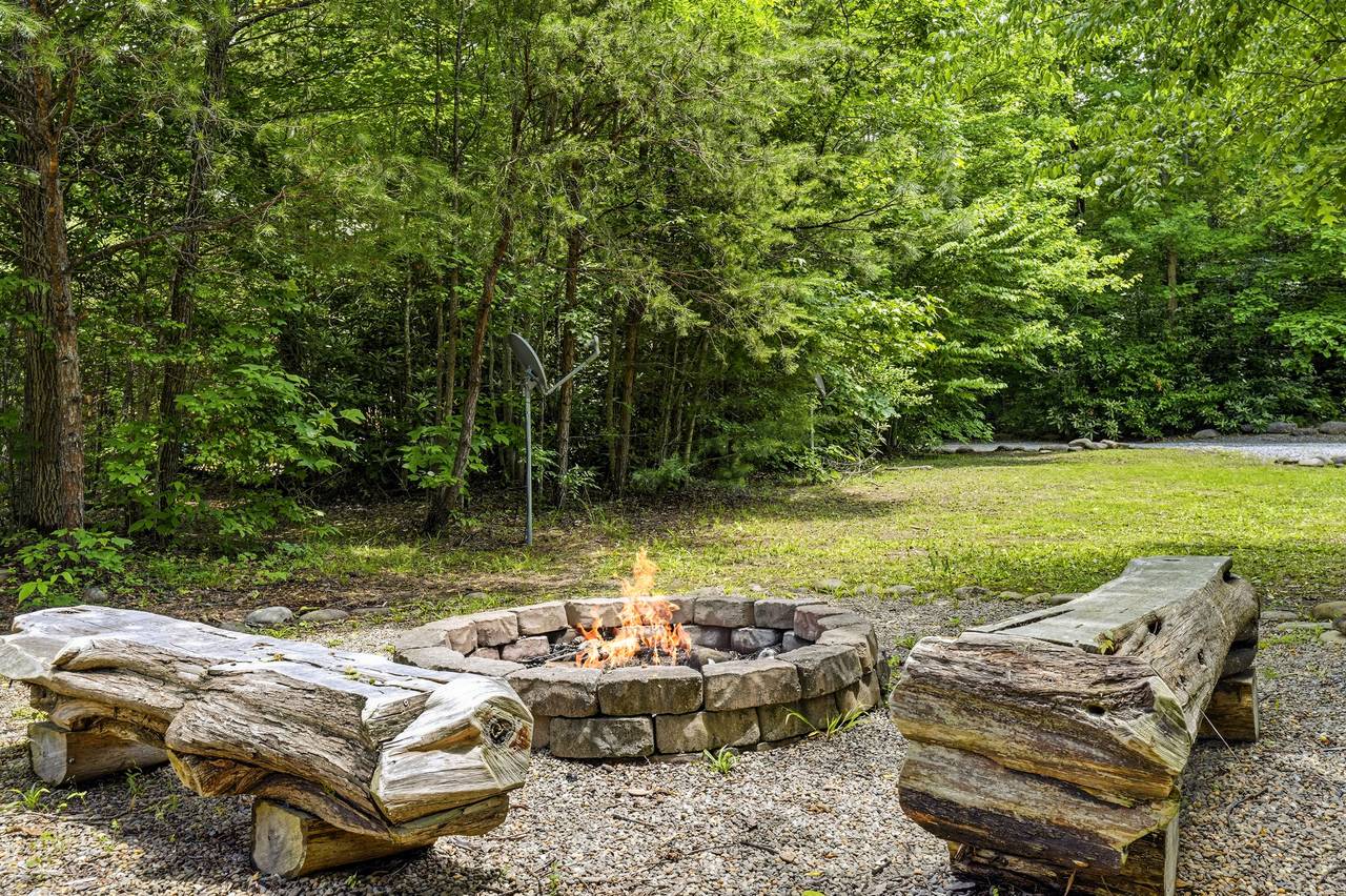 Gather around the fire pit for stories, laughter, and s'mores. Gather around the fire pit for stories, laughter, and s'mores.