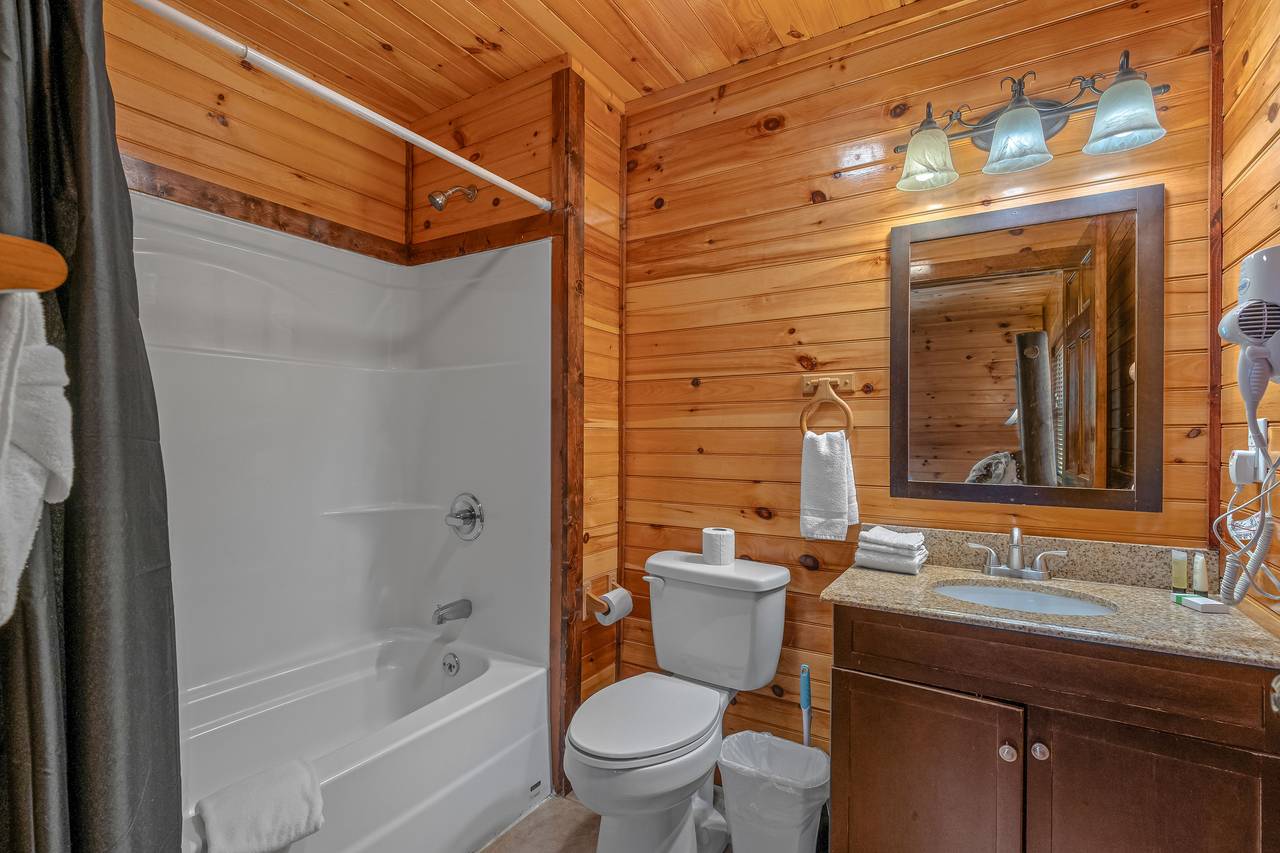 <span class="name">Bath 1; queen/futon ensuite bathroom with tub/shower combo</span> <span class="name">Bath 1; queen/futon ensuite bathroom with tub/shower combo</span>