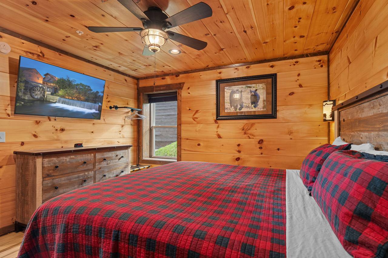 Bed 5 - lower level king bed with TV and ensuite bathroom Bed 5 - lower level king bed with TV and ensuite bathroom