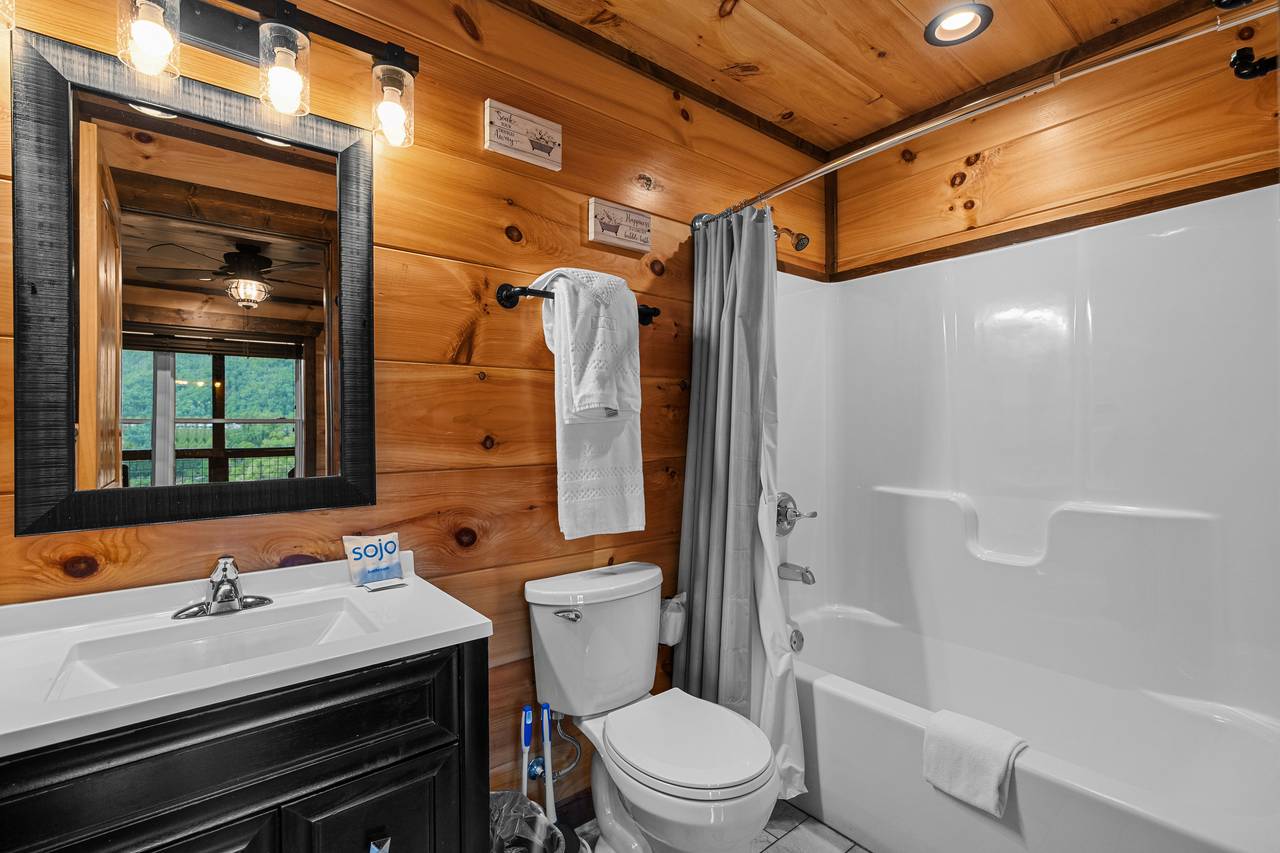 Lower level ensuite bathroom with tub/shower combo Lower level ensuite bathroom with tub/shower combo