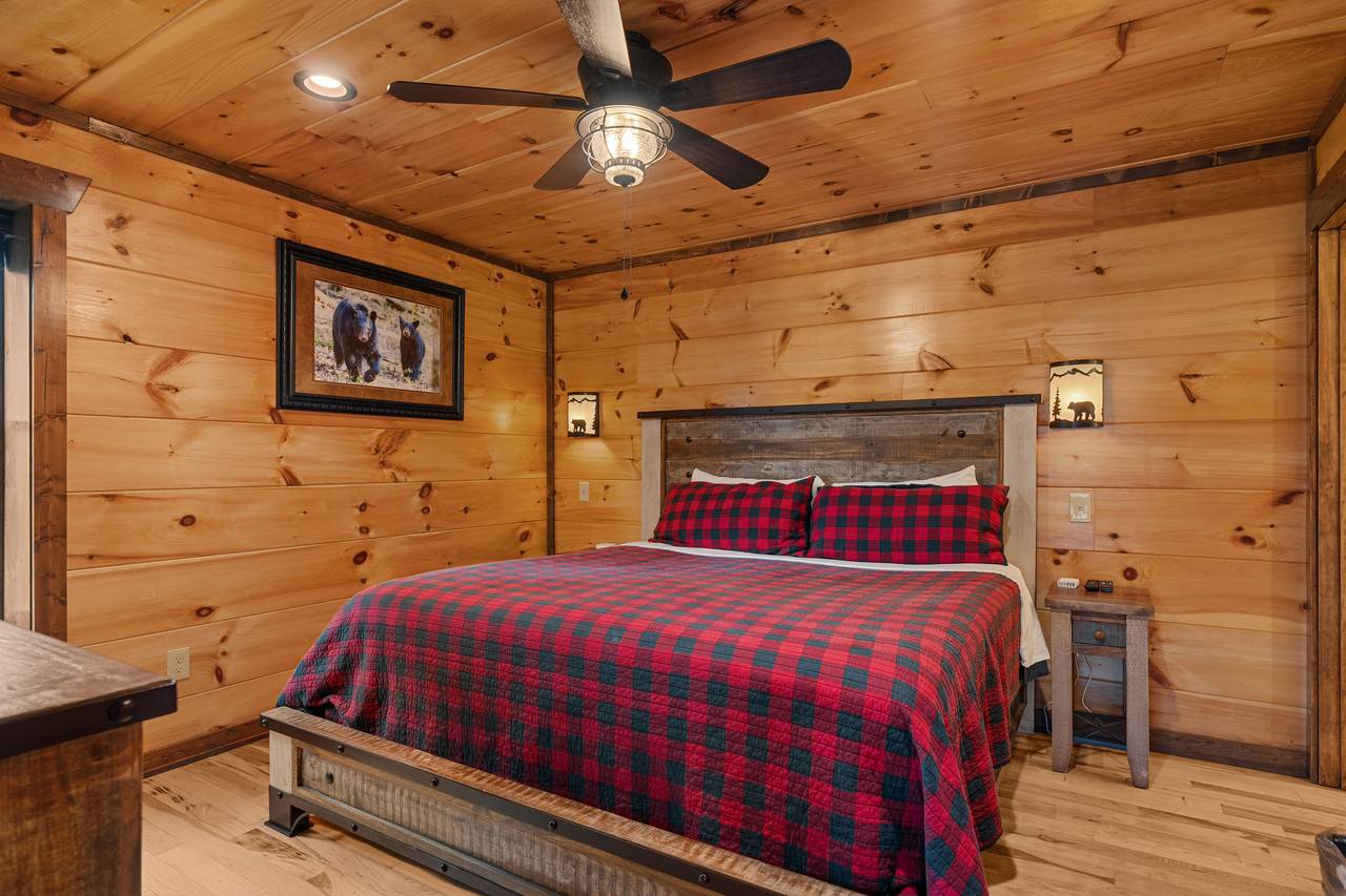 Bed 5 - lower level king bed with TV and ensuite bathroom Bed 5 - lower level king bed with TV and ensuite bathroom