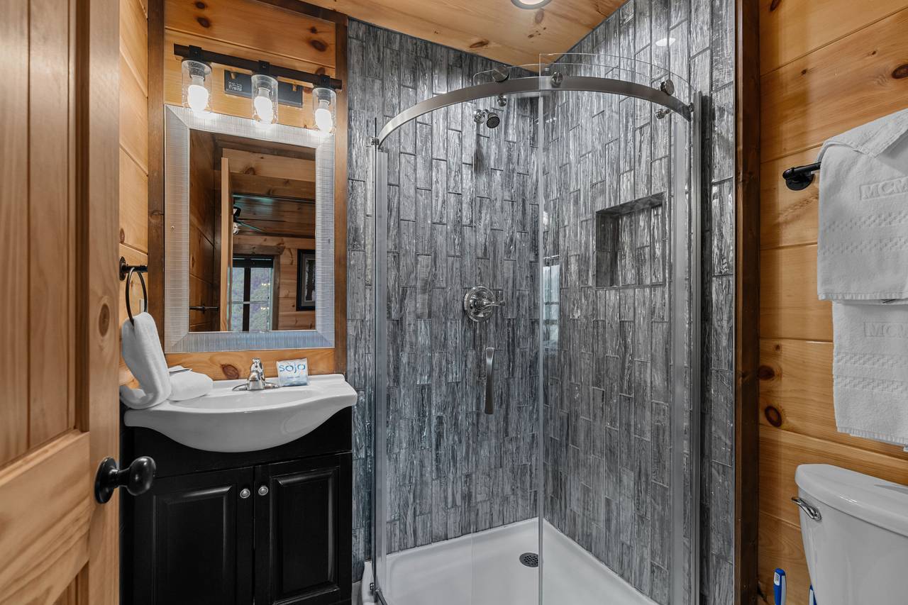 Mid level ensuite bathroom with standing shower Mid level ensuite bathroom with standing shower