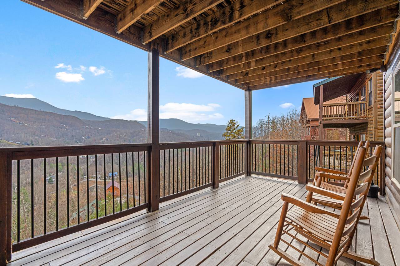 <span class="name">Expansive Deck With Rocking Chairs & Views</span> <span class="name">Expansive Deck With Rocking Chairs & Views</span>