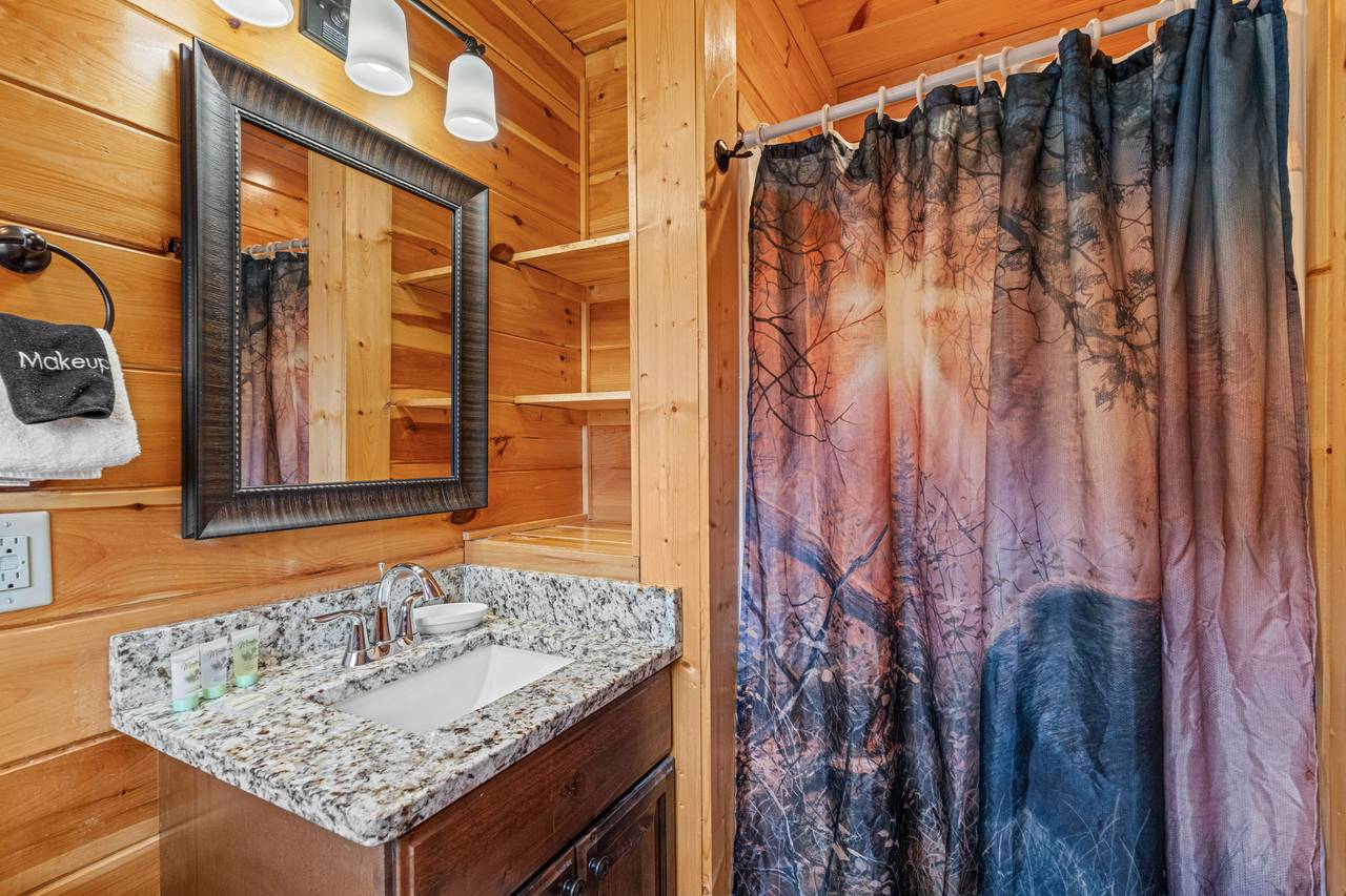 <span class="name">Ensuite Bathroom With Walk-In Shower - main level</span> <span class="name">Ensuite Bathroom With Walk-In Shower - main level</span>