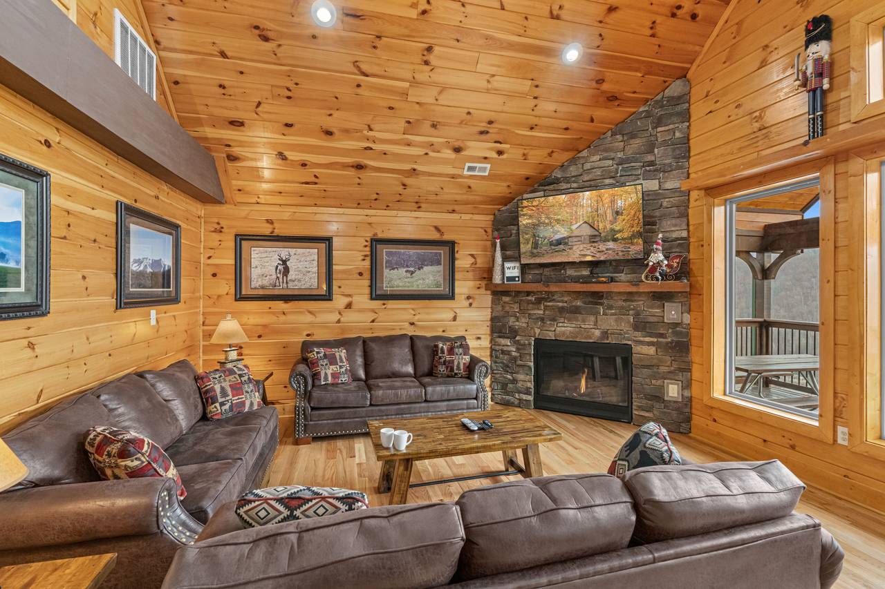 <span class="name">Open Living Room With Vaulted Ceilings & Stone Fireplace</span> <span class="name">Open Living Room With Vaulted Ceilings & Stone Fireplace</span>