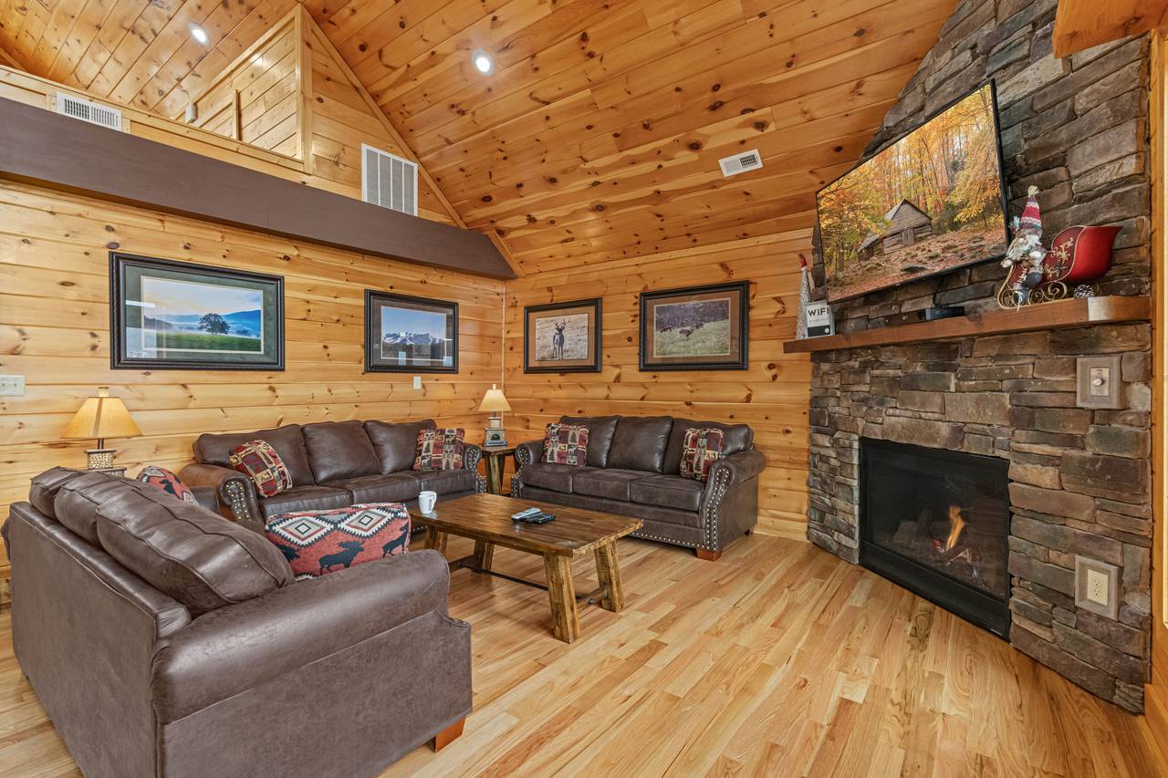 <span class="name">Open Living Room With Vaulted Ceilings & Stone Fireplace</span> <span class="name">Open Living Room With Vaulted Ceilings & Stone Fireplace</span>