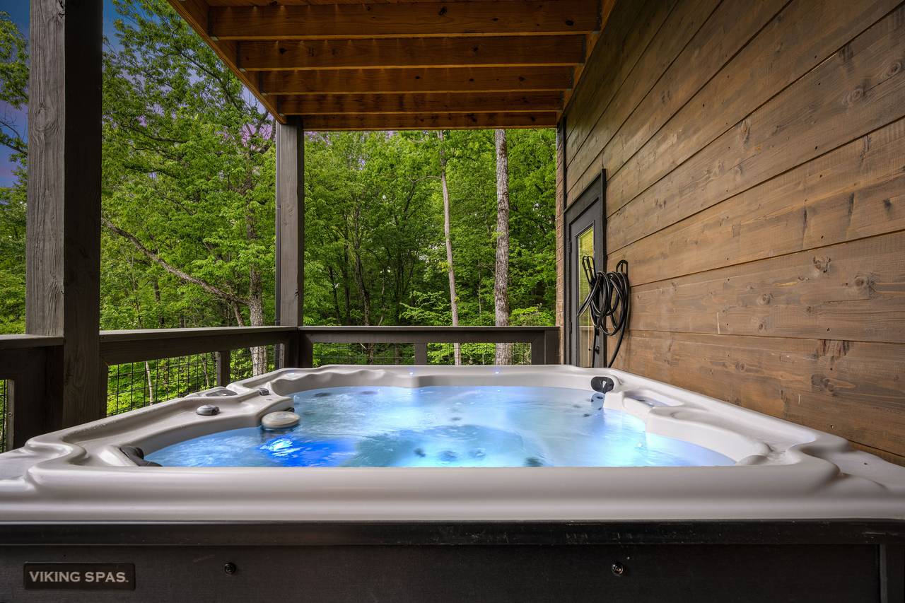 Relax & unwind with mountain views from the bubbling hot tub! Relax & unwind with mountain views from the bubbling hot tub!