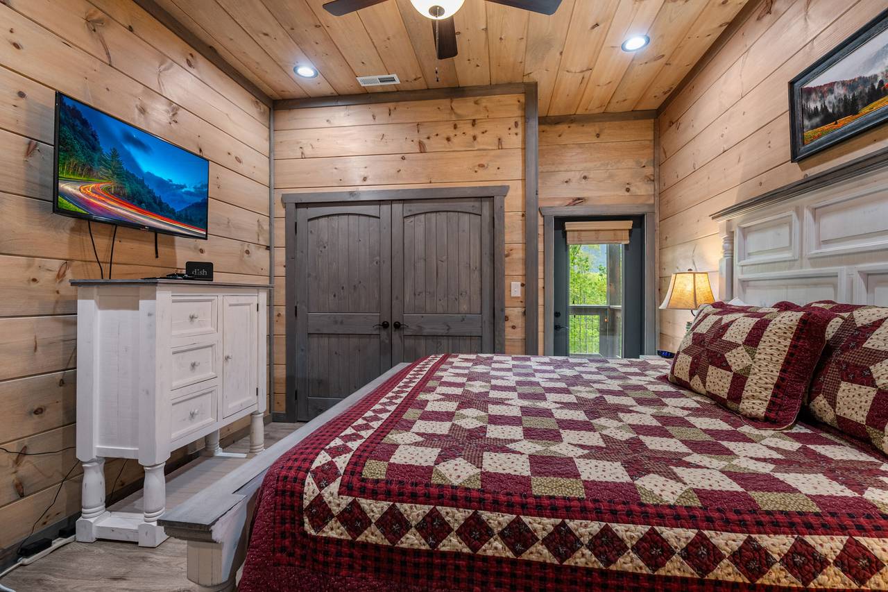 Lower level king suite with TV and private full bathroom Lower level king suite with TV and private full bathroom