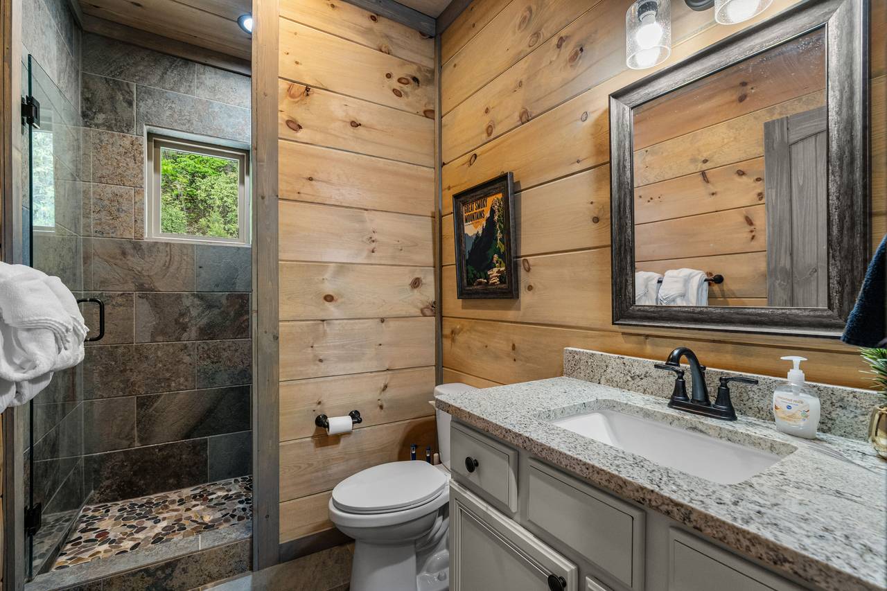 Private ensuite bath with sleek and spacious walk-in shower Private ensuite bath with sleek and spacious walk-in shower
