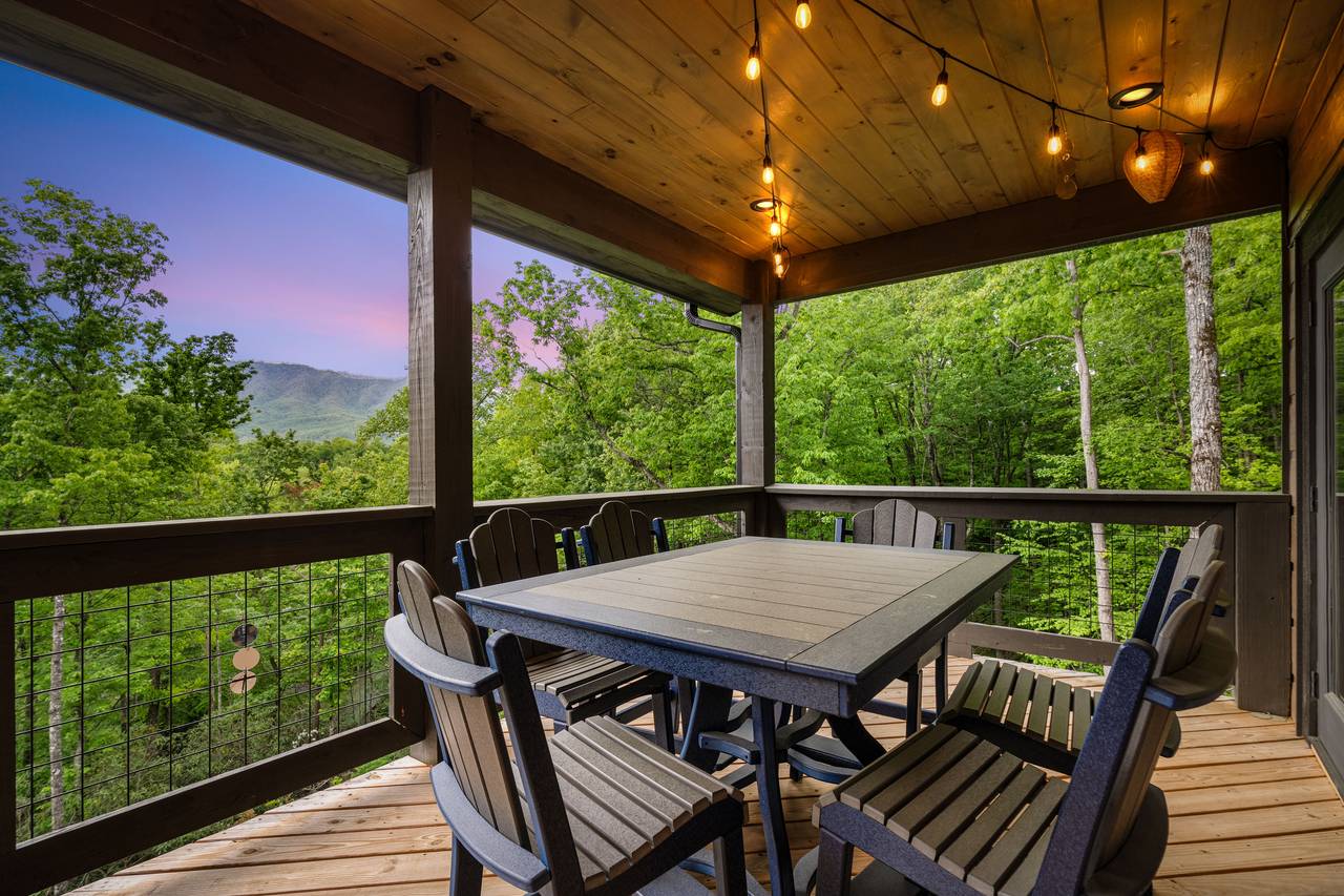 Dine outdoors with a view at the table on the spacious deck! Dine outdoors with a view at the table on the spacious deck!