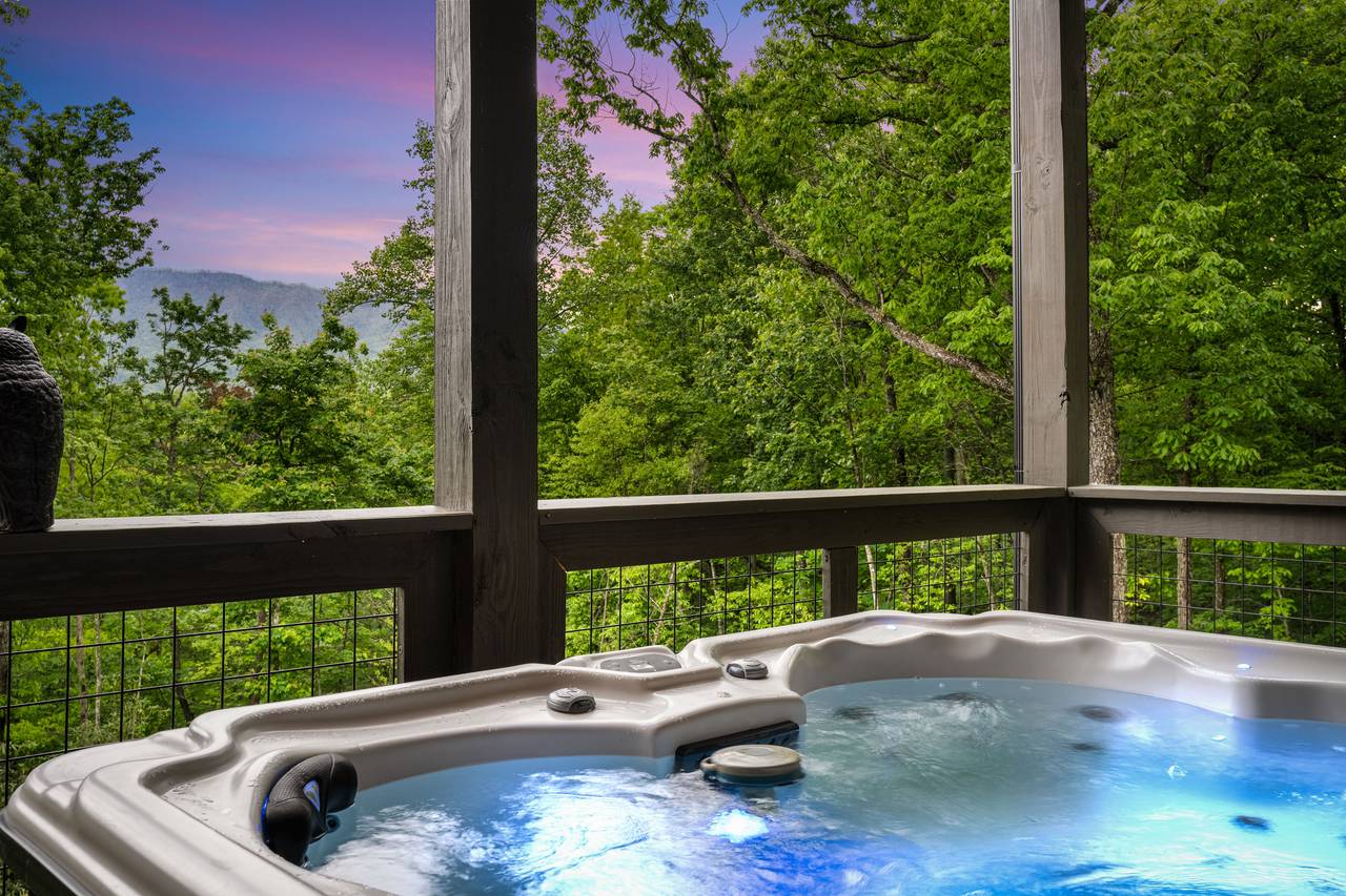 Relax & unwind with mountain views from the bubbling hot tub! Relax & unwind with mountain views from the bubbling hot tub!