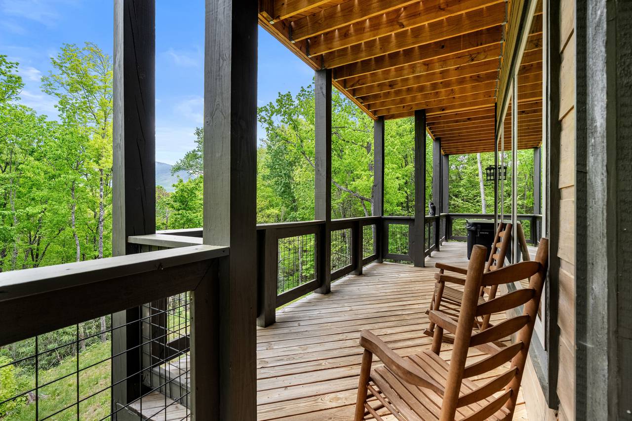 Unwind in a rocking chair on the peaceful deck Unwind in a rocking chair on the peaceful deck