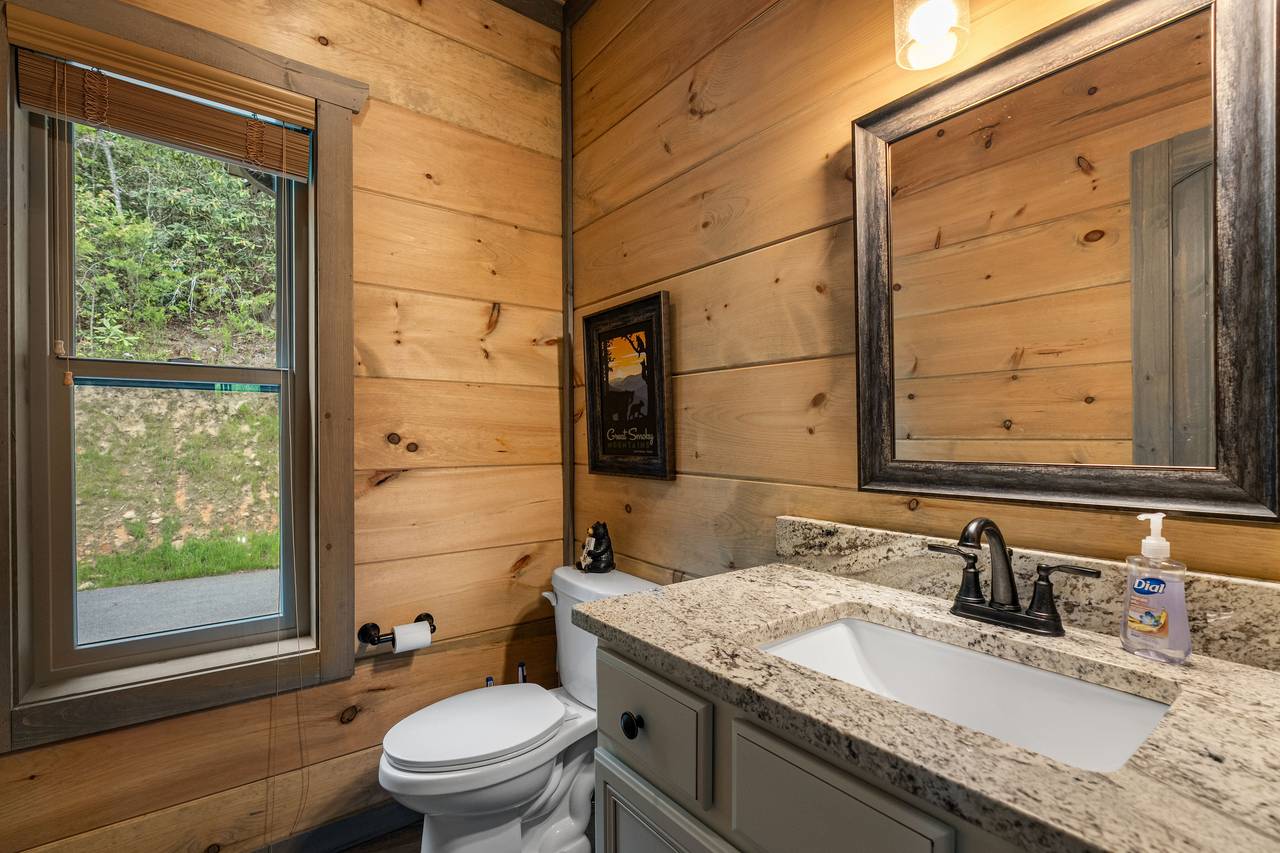 Half bath on main level off the living room Half bath on main level off the living room