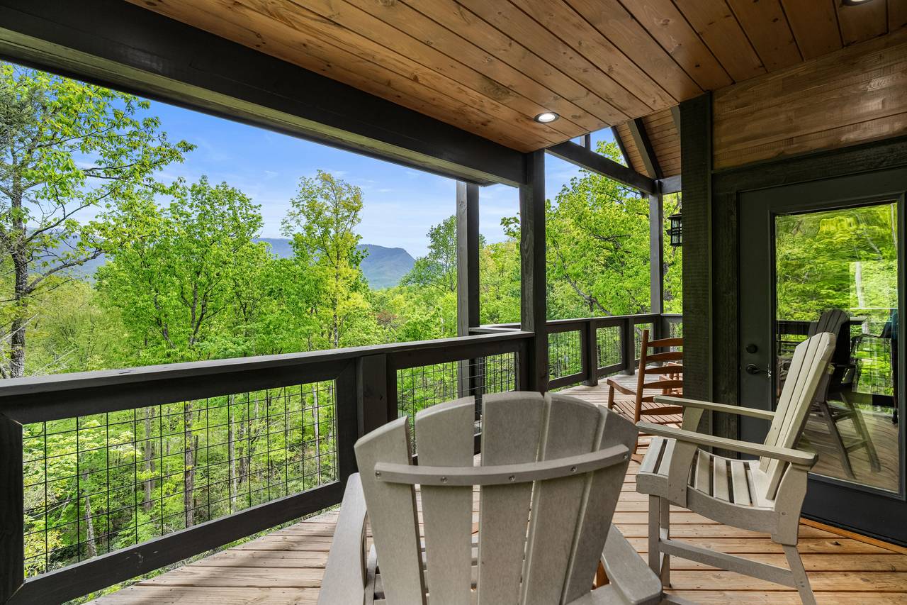 Unwind in a rocking chair on the peaceful deck Unwind in a rocking chair on the peaceful deck