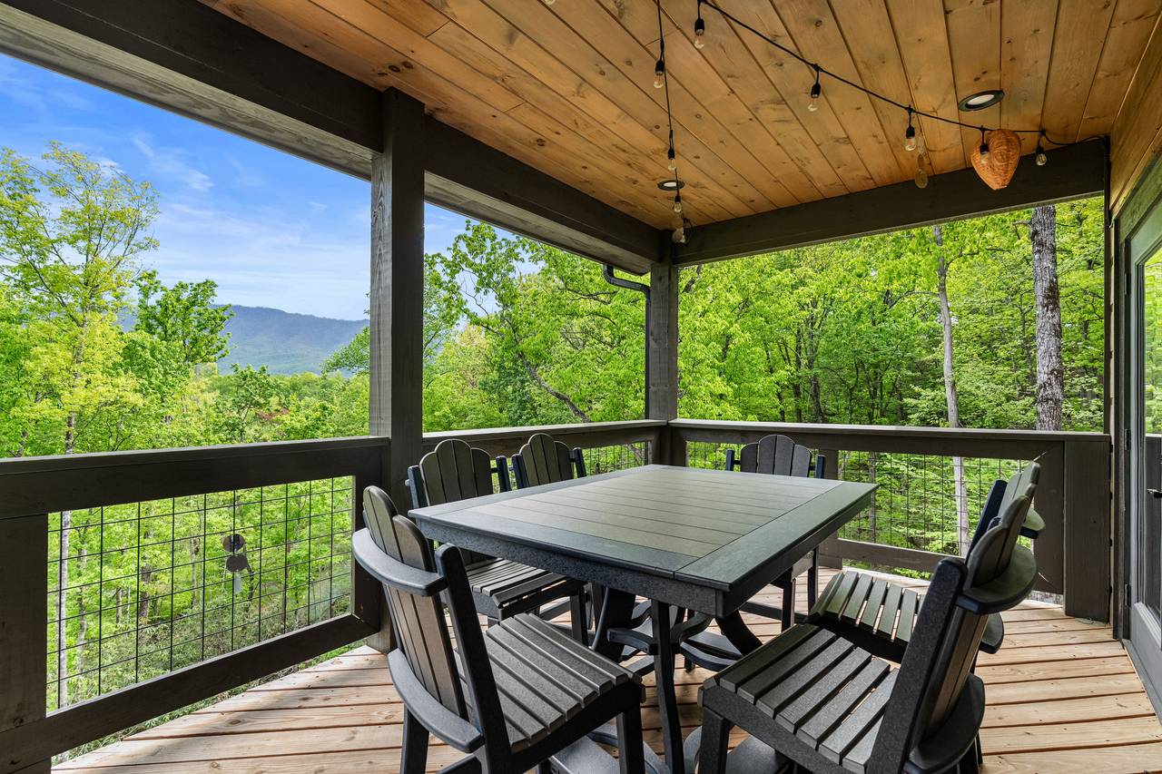 Dine outdoors with a view at the table on the spacious deck! Dine outdoors with a view at the table on the spacious deck!