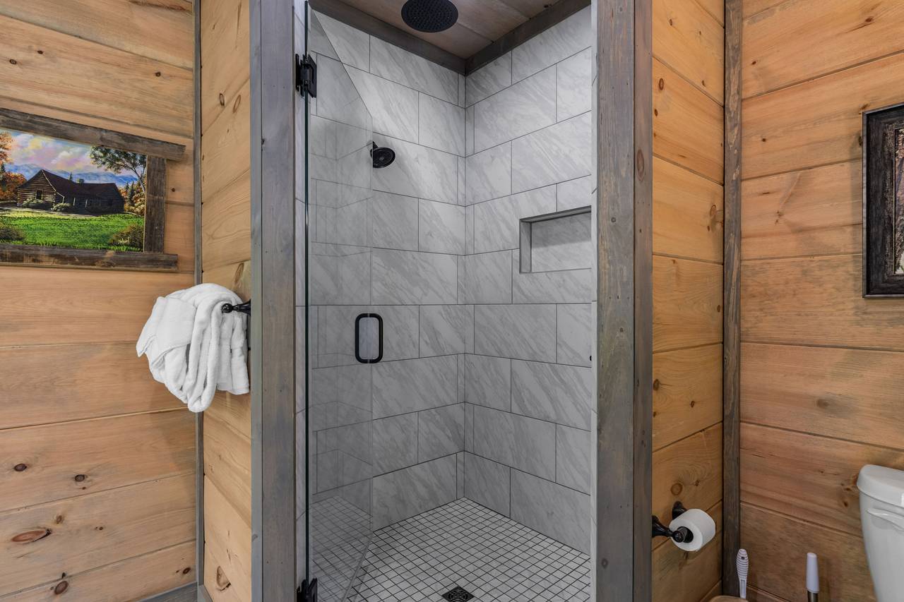 Soak or shower in the main level bath with tub and walk-in showe Soak or shower in the main level bath with tub and walk-in showe