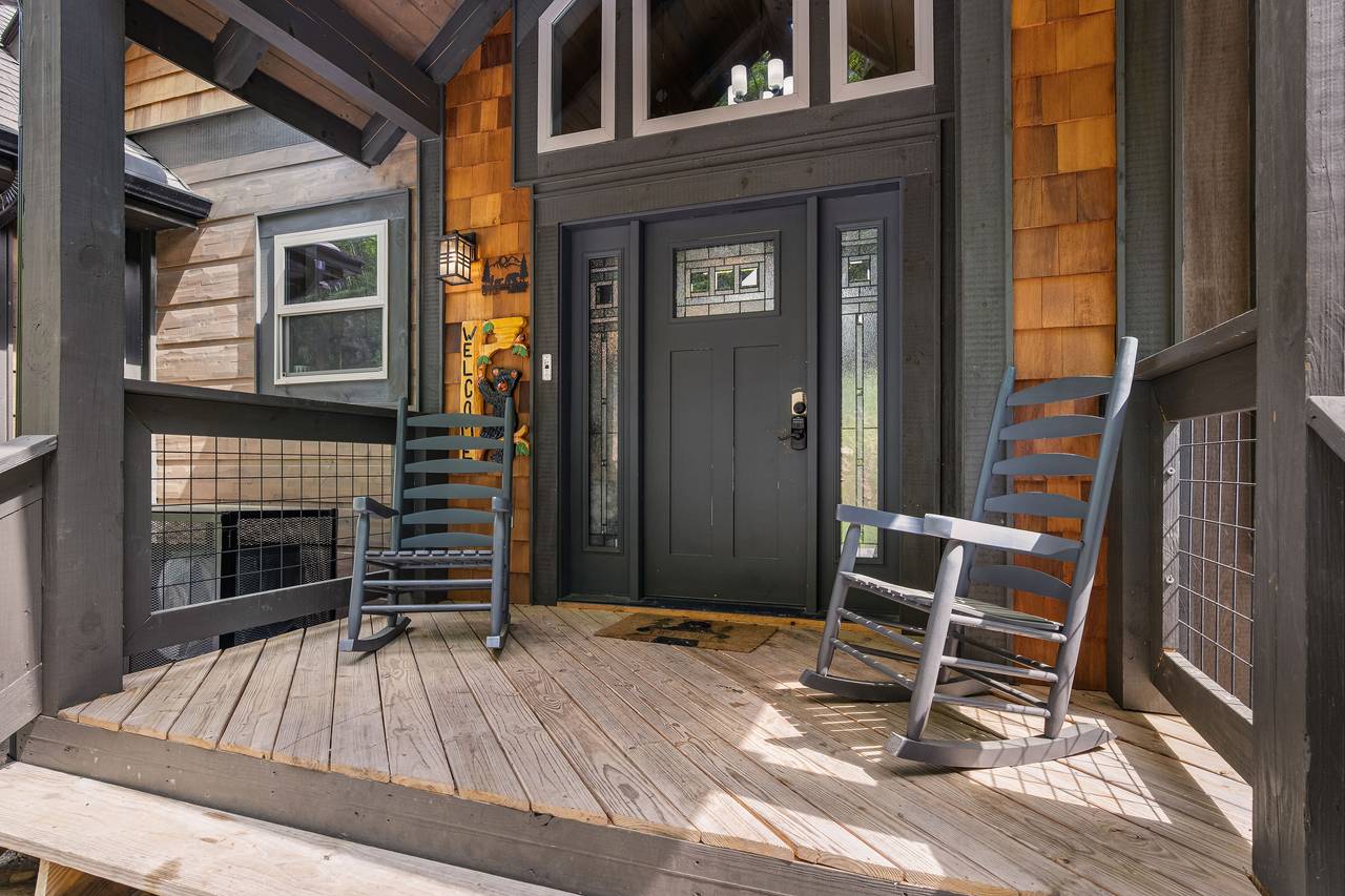 Unwind in a rocking chair on the peaceful front deck Unwind in a rocking chair on the peaceful front deck