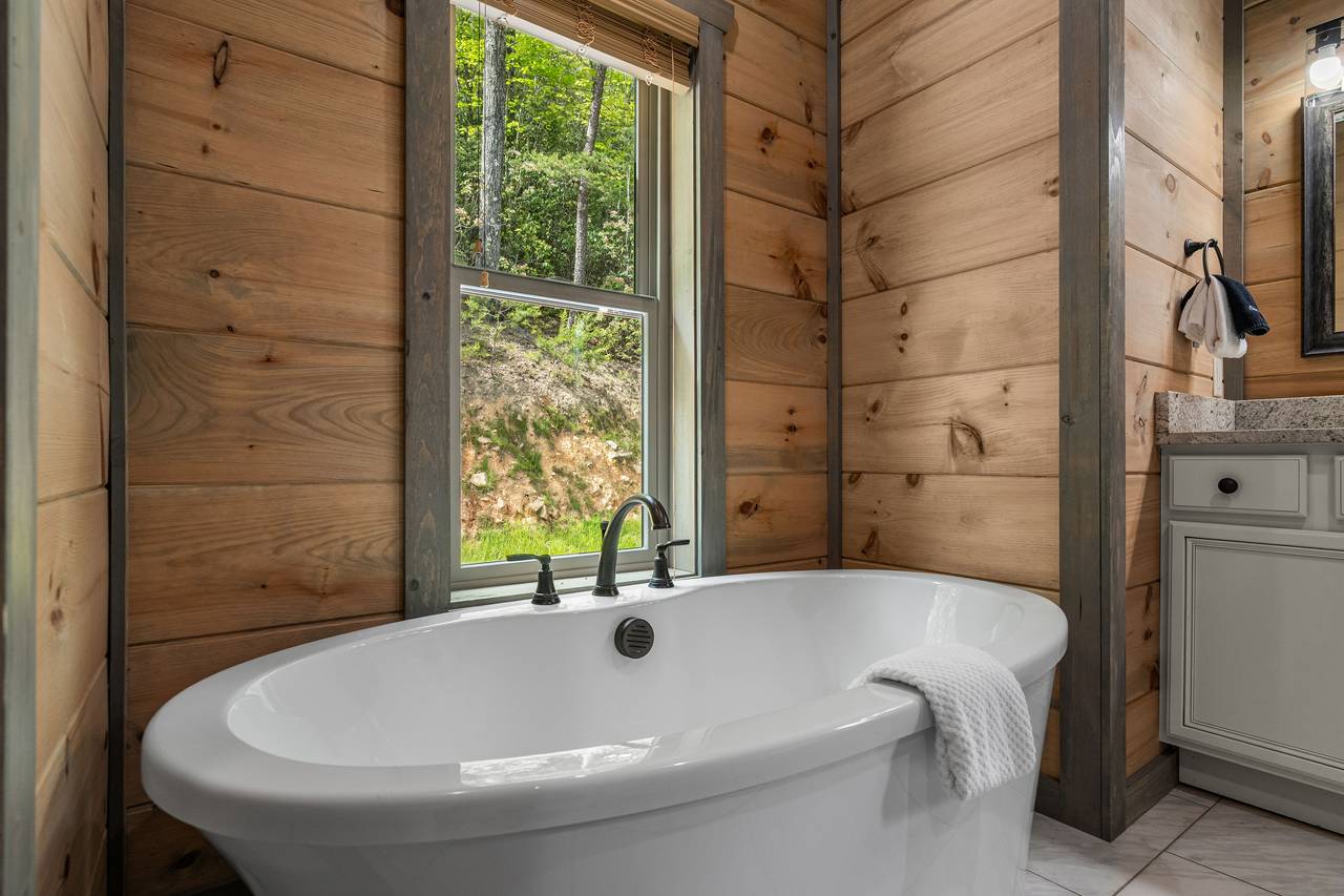 Soak or shower in the main level bath with tub & walk-in shower Soak or shower in the main level bath with tub & walk-in shower