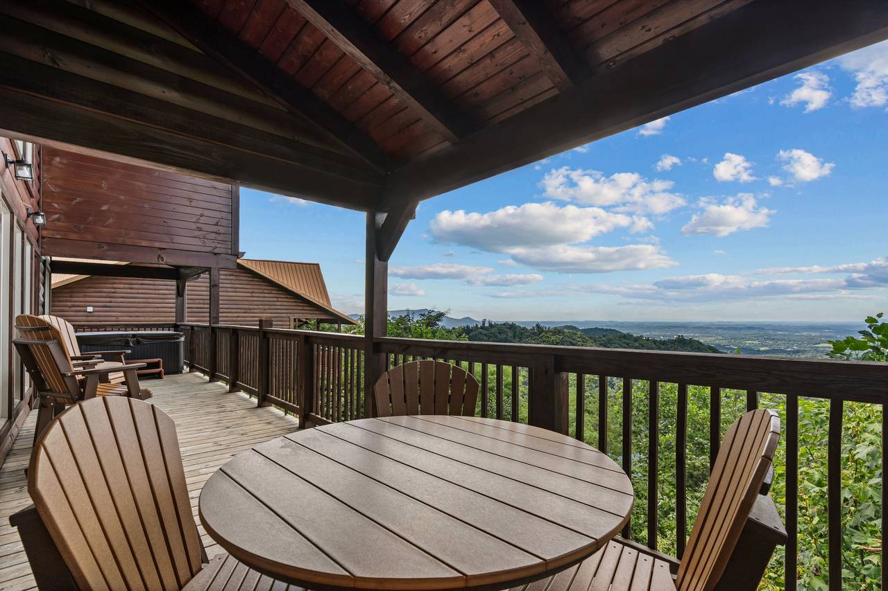 Spacious deck with seating to enjoy Smoky Mountain sunsets Spacious deck with seating to enjoy Smoky Mountain sunsets
