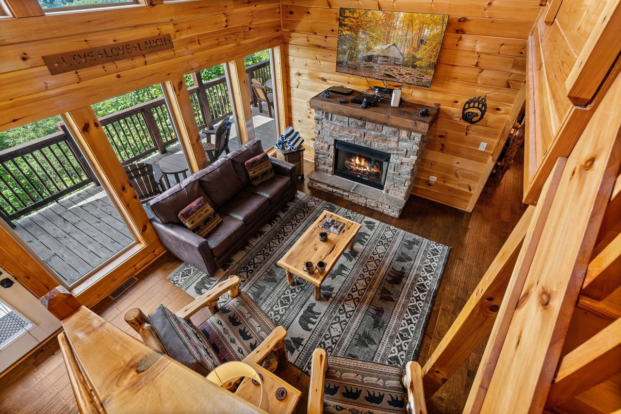 Cozy living area with fireplace & 65" smart TV Cozy living area with fireplace & 65" smart TV