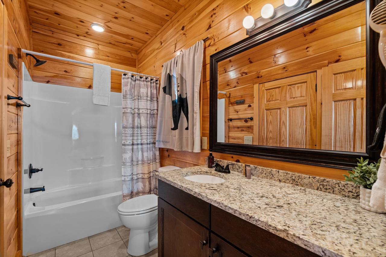 Full bathroom with tub and shower Full bathroom with tub and shower