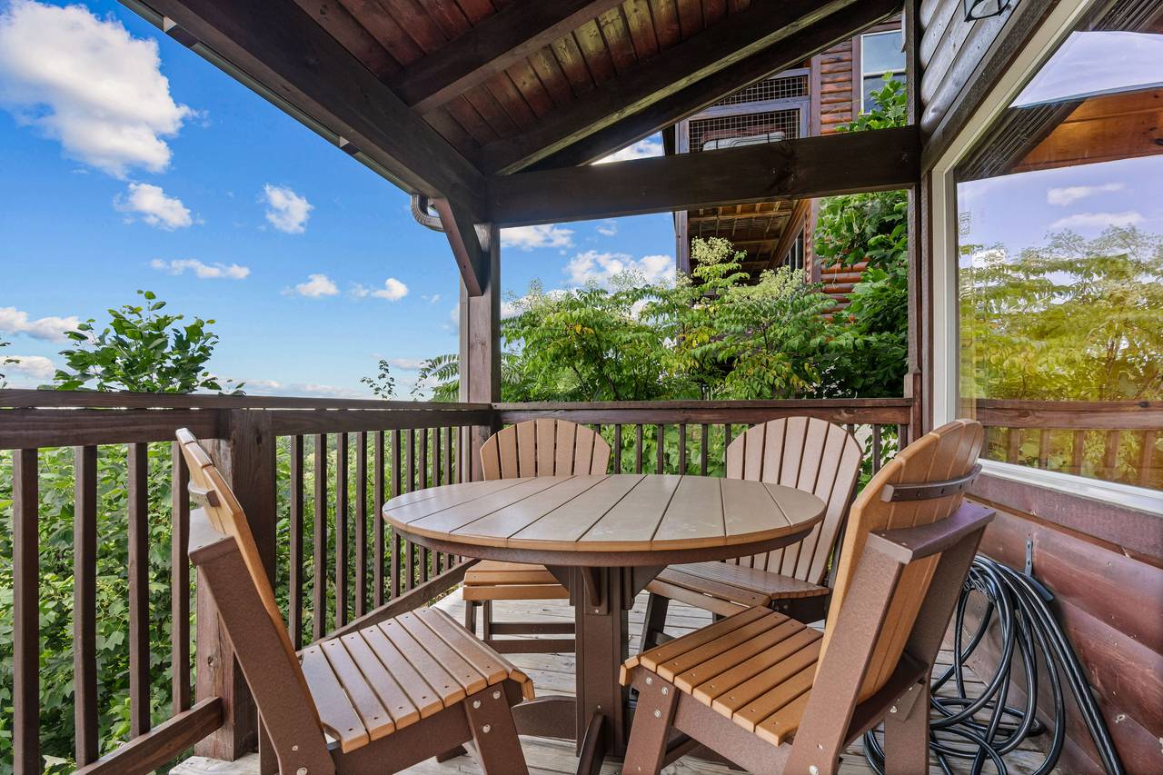 Spacious deck with seating to enjoy Smoky Mountain sunsets Spacious deck with seating to enjoy Smoky Mountain sunsets