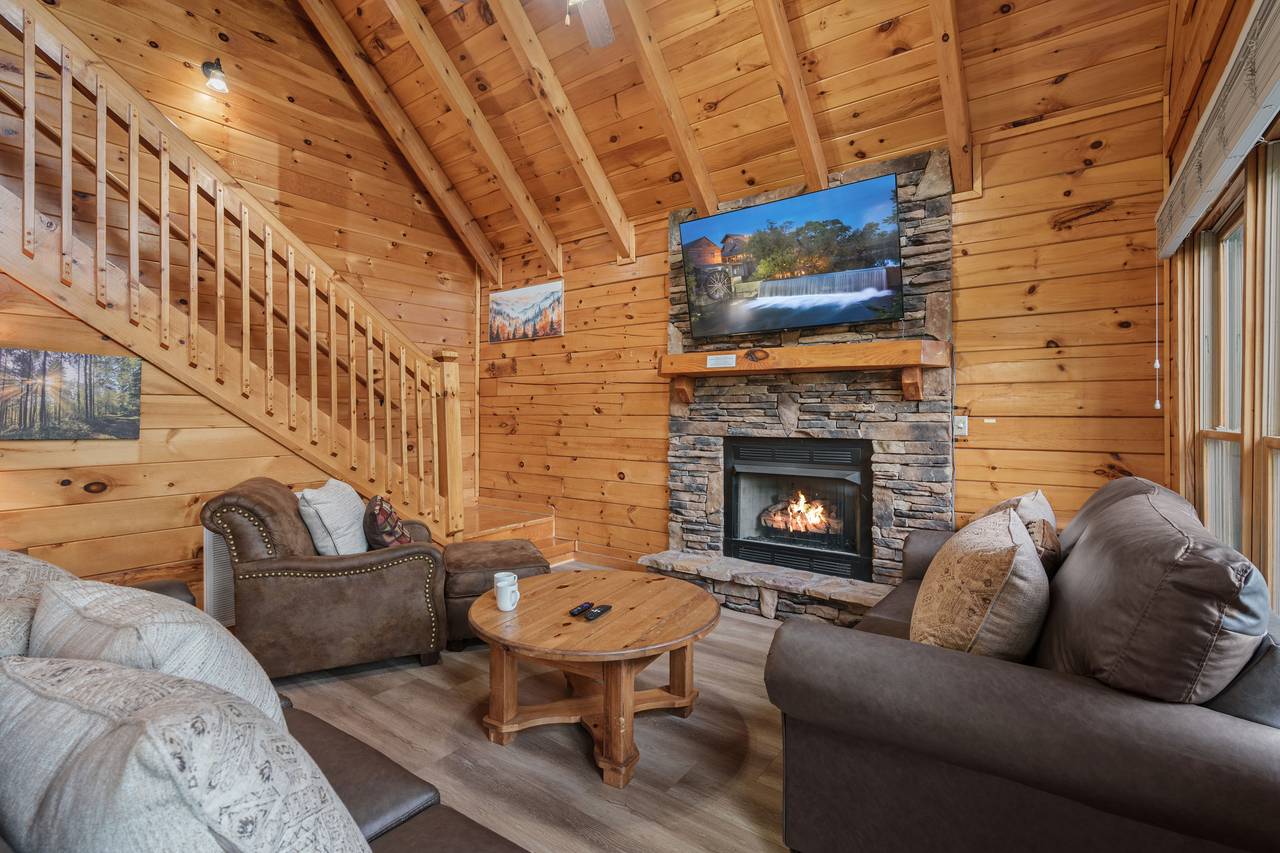 Spacious living room with fireplace & queen sleeper sofa, TV. Spacious living room with fireplace & queen sleeper sofa, TV.