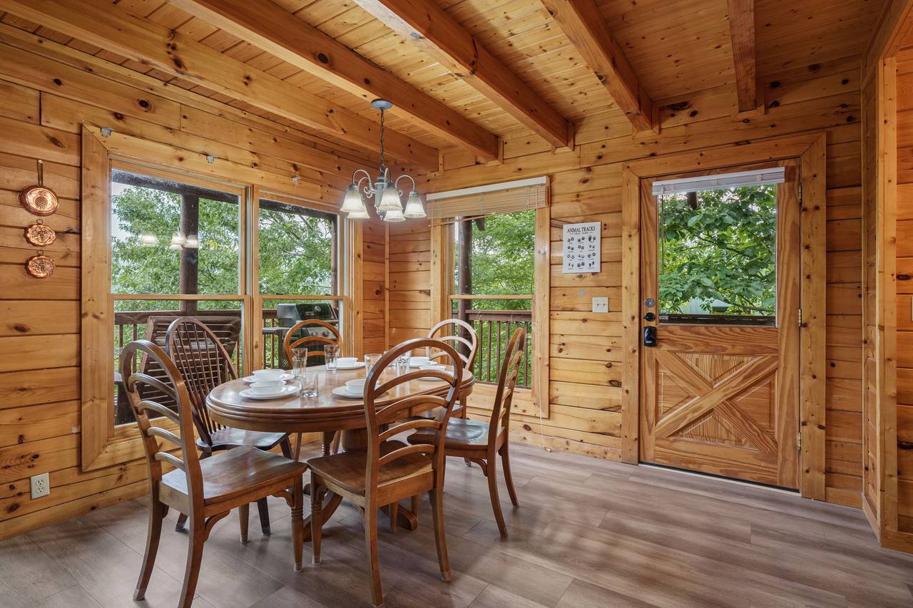 Dining area with seating for a comfortable family meal. Dining area with seating for a comfortable family meal.