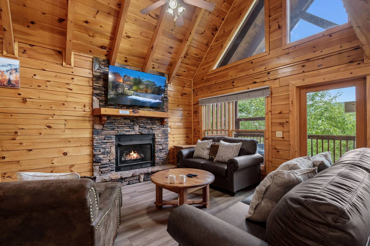 Spacious living room with fireplace & queen sleeper sofa, TV. Spacious living room with fireplace & queen sleeper sofa, TV.