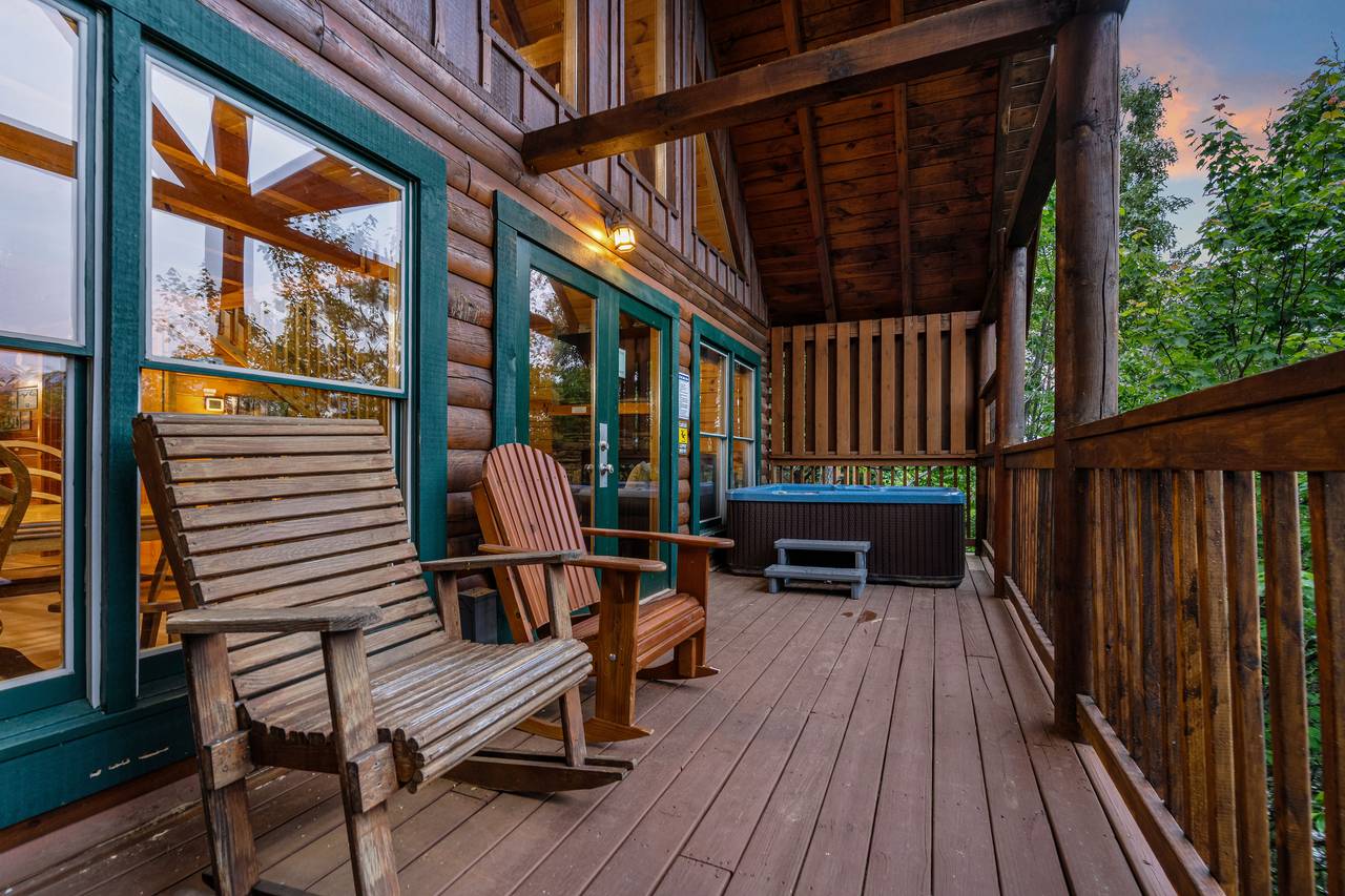 Deck with rocking chairs and stunning Smoky Mountain views. Deck with rocking chairs and stunning Smoky Mountain views.