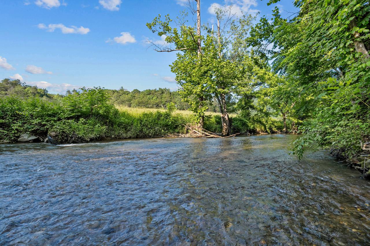 <span class="name">Creekside views just steps from your back deck</span> <span class="name">Creekside views just steps from your back deck</span>