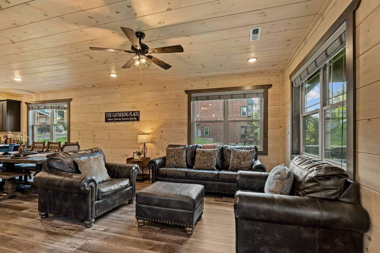 <span class="name">Spacious living room with plush seating & fireplace</span> <span class="name">Spacious living room with plush seating & fireplace</span>